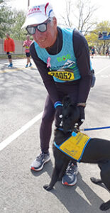 Runner greeting future service dog