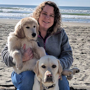 Cheri Van Pelt and 2 yellow labs