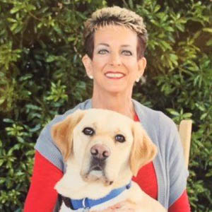 Dawn Abrahamson and yellow lab