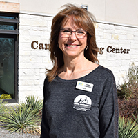 person with Canine Companions logo on shirt