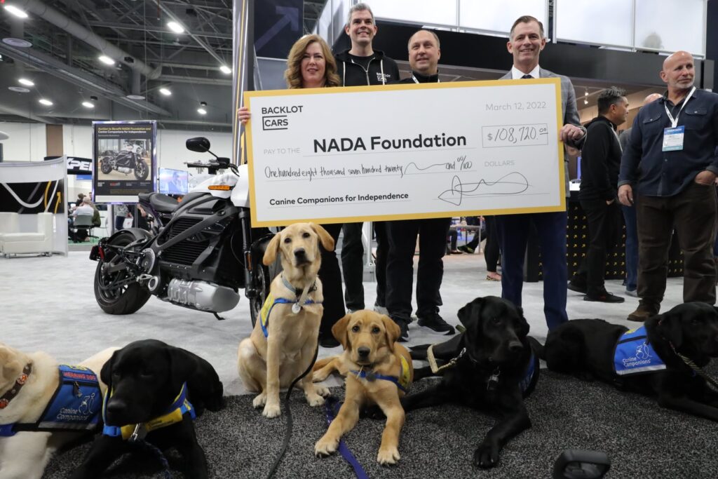 NADA foundation team holding check